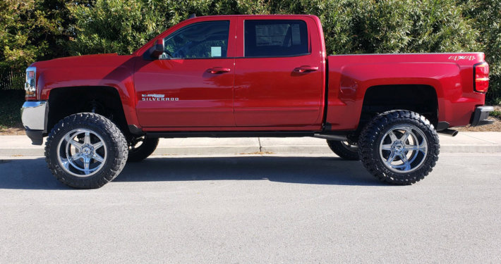 2018 CHEVY 1500 CREW CAB #1T3059 6″ Suspension System w/ Stamped Steel UCA, Hostile Venom 20x12 Rims, 35x12.50x20 Toyo Open Country M/T, AMP Research Electric Side Step Boards, Dual Exhaust System w/ Black Tips, Hypertech Speedometer Calibrator.